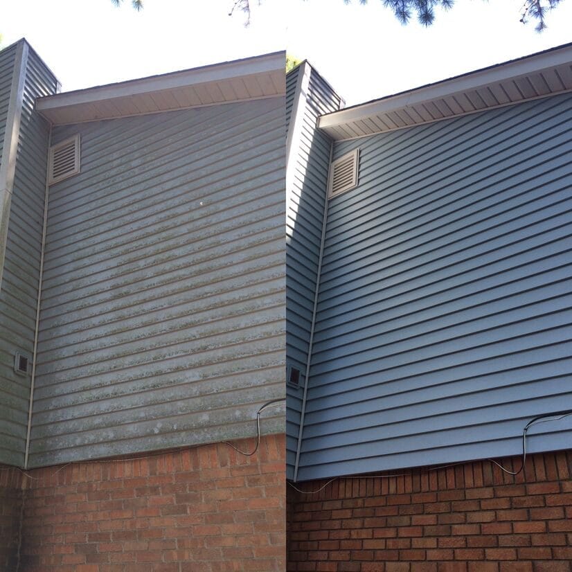 Professional soft wash house washing in Birmingham, AL, safely removing green algae from residential vinyl siding in the Greystone neighborhood.